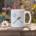 Dragonfly mug featuring a detailed blue dragonfly design against a floral background.
