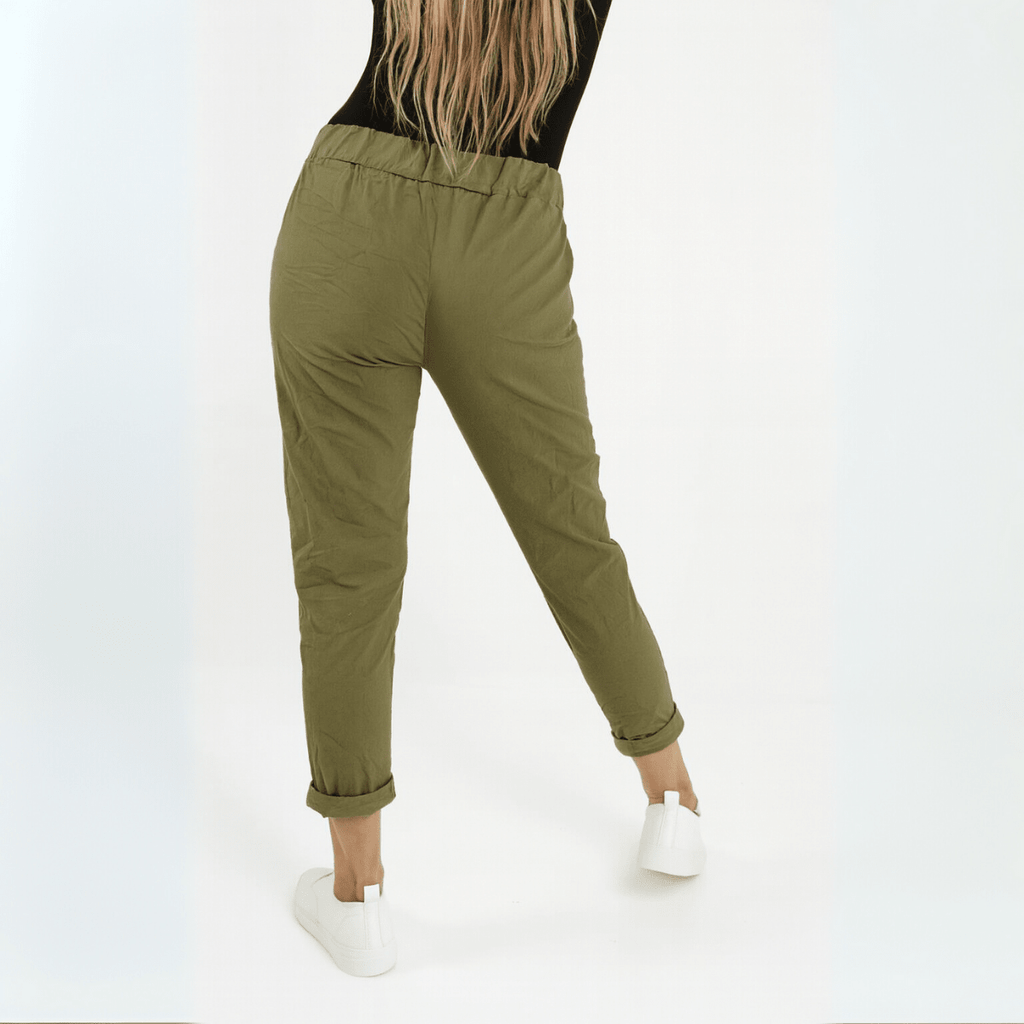 Olive Green Casual Pants featuring a relaxed fit and rolled cuffs.